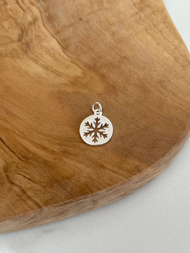 Sterling silver snowflake charm